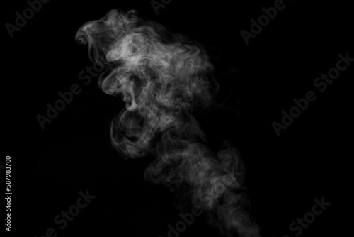 White curling dense smoke steam rising up is isolated on black background to overlay your photos.