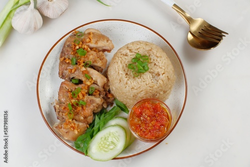 Asian cuisine Hainanese Chicken Rice or nasi hainan photo