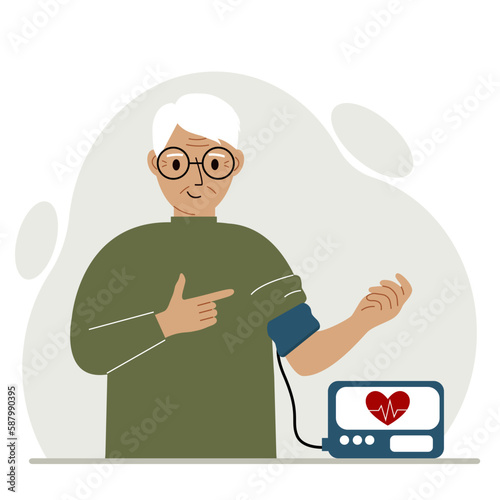 Old man checks blood pressure. healthcare concept. Blood pressure measurement, digital tonometer. Health monitoring.