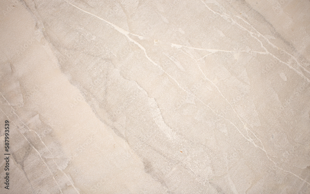 Fototapeta premium Brown background from decorative plaster with abstract spots. Unusual beige wall texture with beautiful patterns, creative surface background. Front covering for facing of buildings.