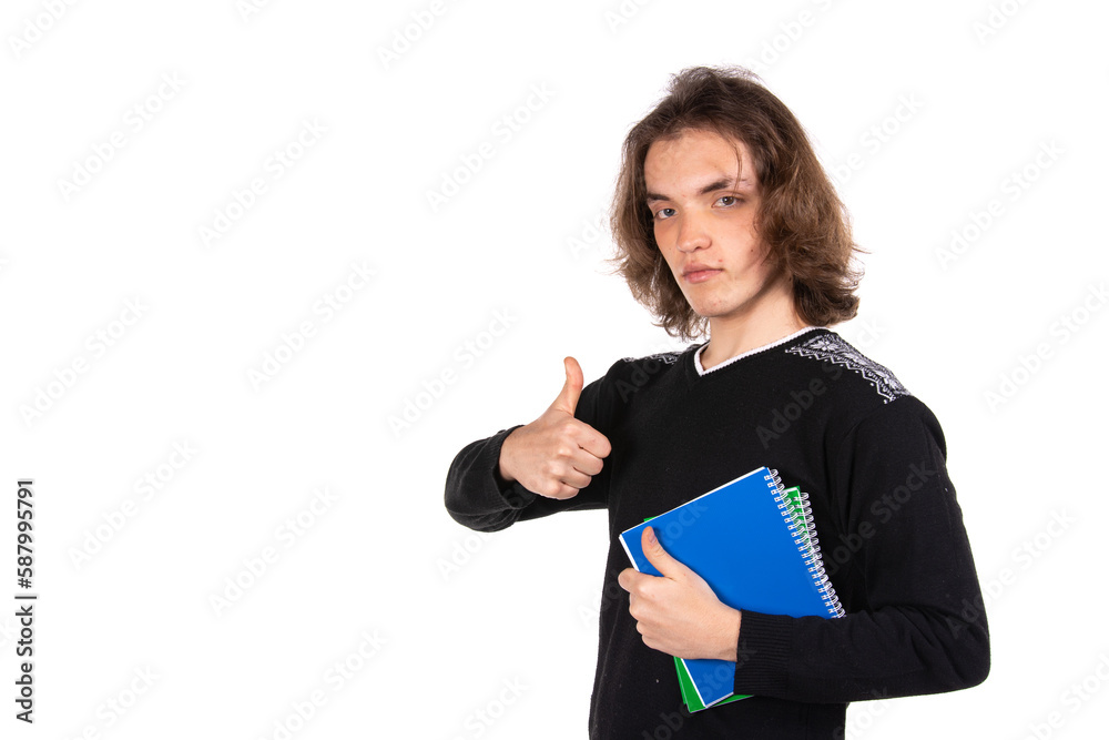 Young attractive student posing in the studio. Young attractive student posing in the studio.