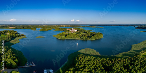 Drone aerial landscape photo - Camaldolese monastery complex and Wigry Lake, national park - summer in Poland photo