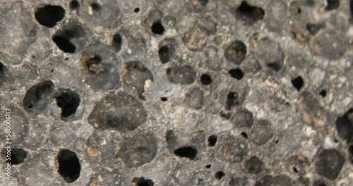 gray porous pumice stone as a volcanic igneous rock photo