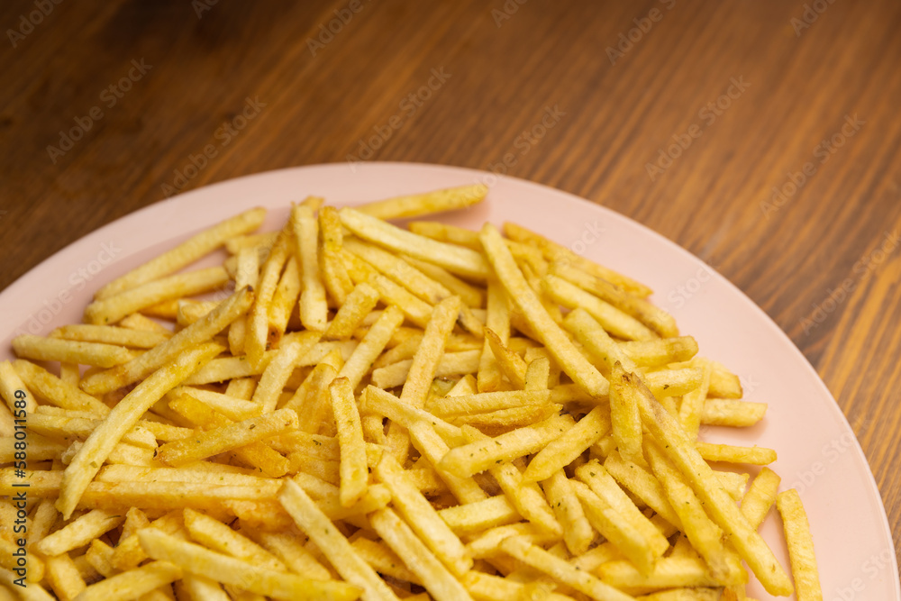 potato straw close-up. potato in a bowl on a wooden table potato straw close-up. potato in a bowl on a wooden table