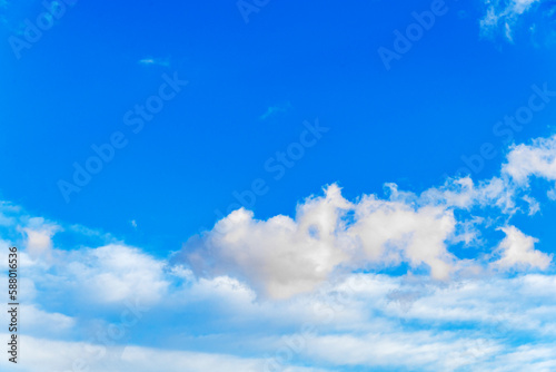 Sky blue background. Blue sky background with clouds.