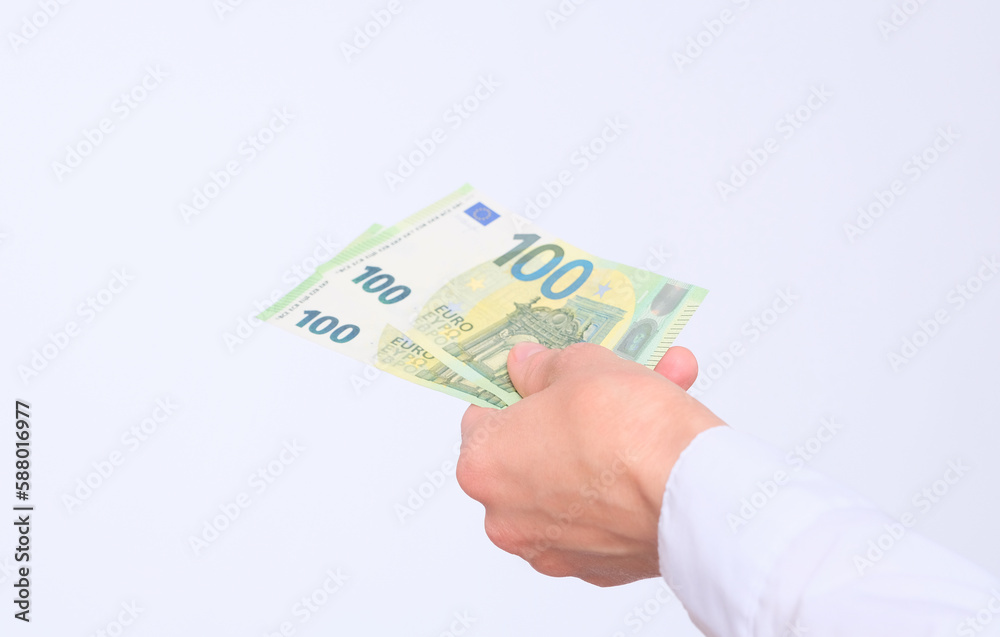 Female hand holds euro banknotes Female hand holds euro banknotes