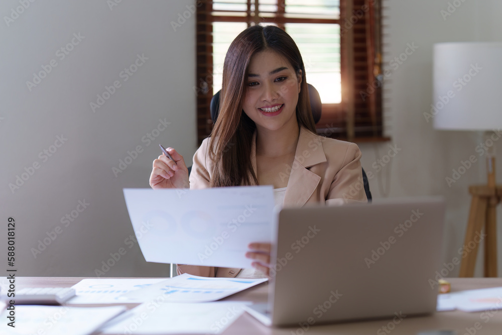Accountant asian business person analysis finance document, tax, exchange, accounting and Financial advisor concept Accountant asian business person analysis finance document, tax, exchange, accounting and Financial advisor concept