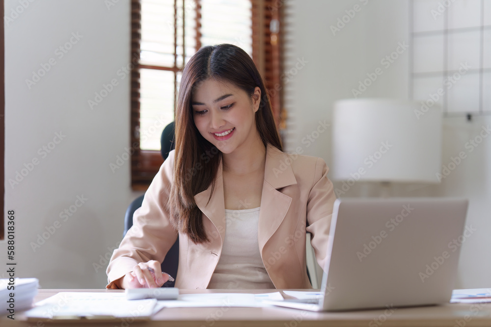 Accountant asian business person analysis finance document, tax, exchange, accounting and Financial advisor concept Accountant asian business person analysis finance document, tax, exchange, accounting and Financial advisor concept