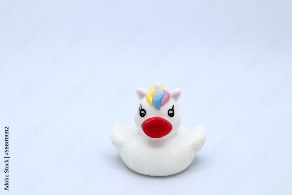 Tiny plastic unicorn duck. Close up and isolated. Tiny plastic unicorn duck. Close up and isolated.