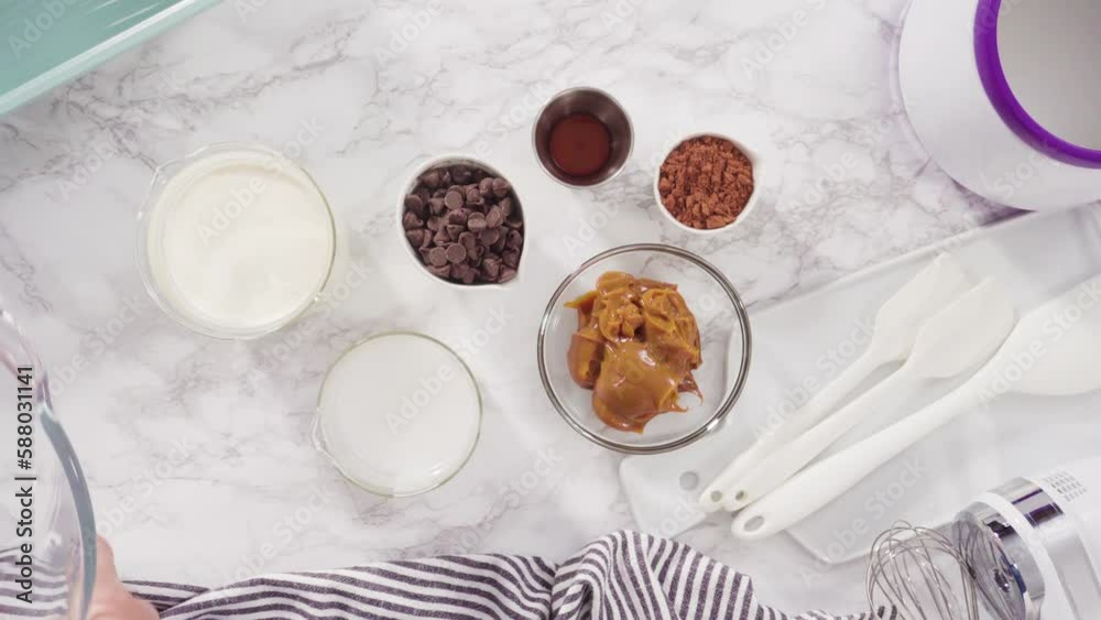 Flat lay. Ingredients to prepare chocolate ice cream on the counter. Flat lay. Ingredients to prepare chocolate ice cream on the counter.