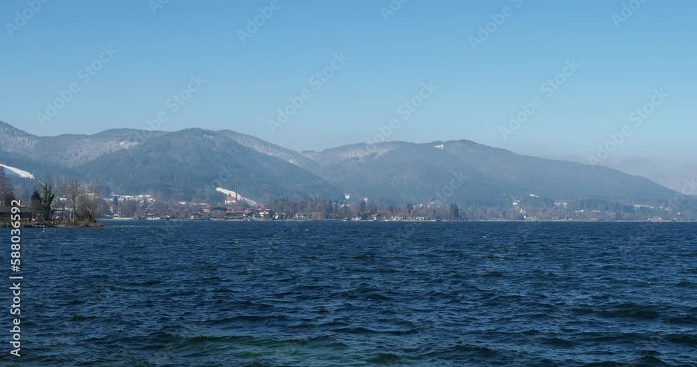 Egerner Bucht am Tegernsee mit Blick auf Bad Wiessee und seinen Glockenturm am Horizont Egerner Bucht am Tegernsee mit Blick auf Bad Wiessee und seinen Glockenturm am Horizont