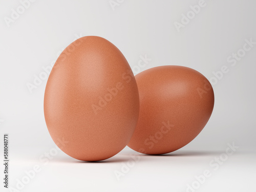 Two fresh chicken egg shots on white background