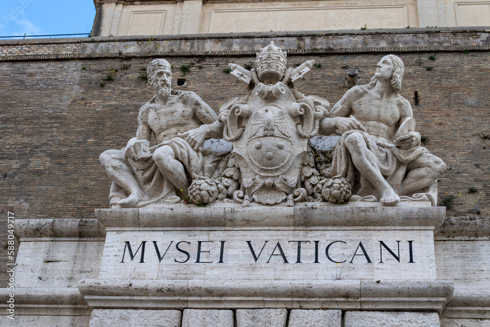 Vatican museum insignia at St. Peter's, Rome. Entrance to the pope's museums in the Vatican state.