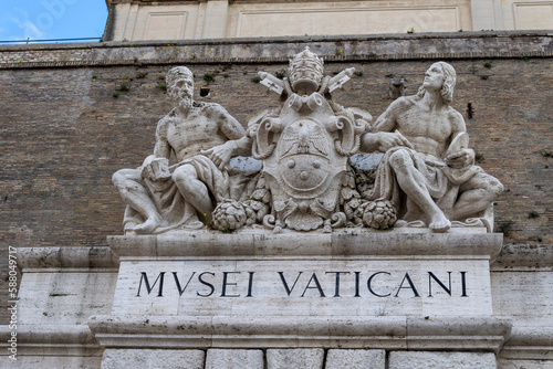 Vatican museum insignia at St. Peter's, Rome. Entrance to the pope's museums in the Vatican state.