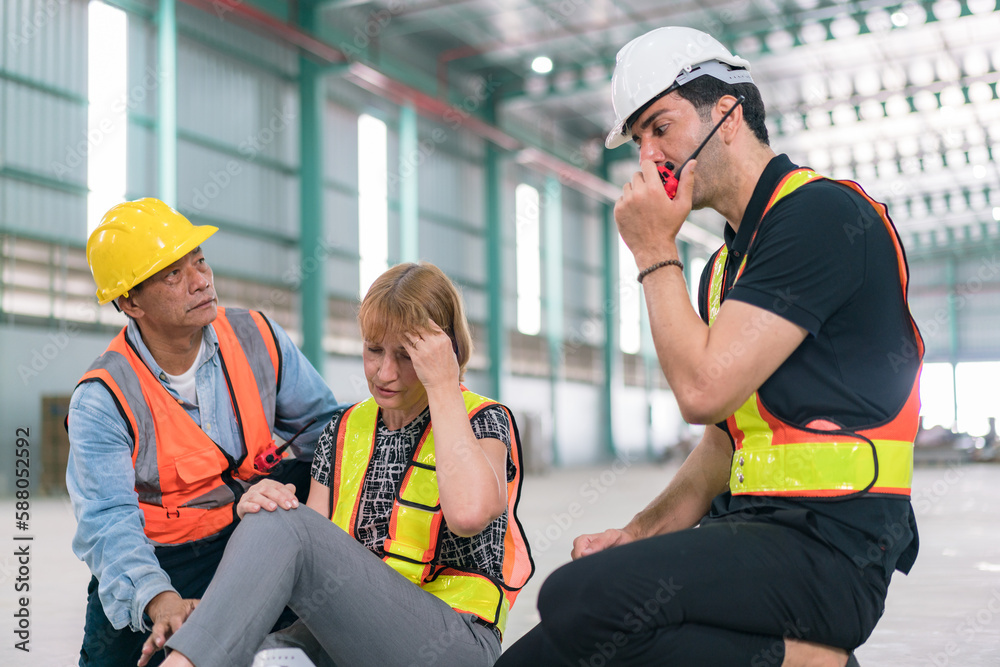 Emergency help engineers provide first aid to construction workers in accidents. Safety team help a construction worker who has an accident.