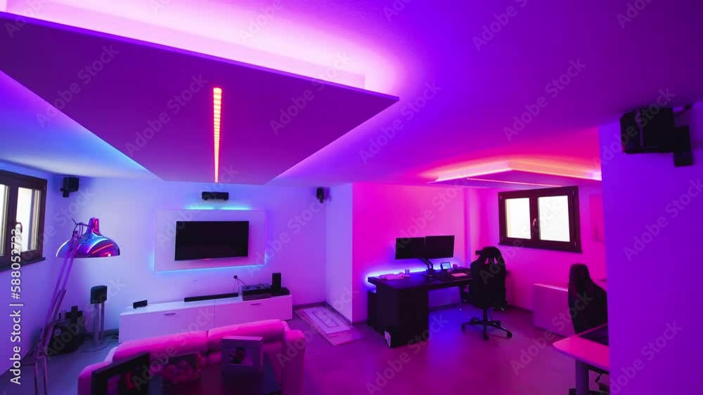 Smart home system monitor screen with all the lights on with different colors. Sofa and modern Tv Smart home system monitor screen with all the lights on with different colors. Sofa and modern Tv