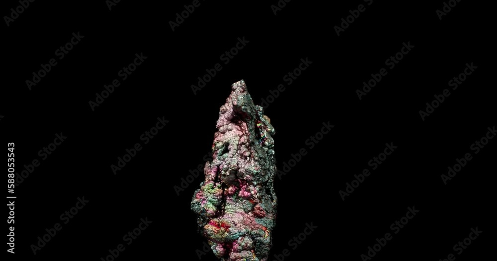 Iridescent goethite 360° rotation in 4k. macro detail texture background. close-up raw rough unpolished semi-precious gemstone Iridescent goethite 360° rotation in 4k. macro detail texture background. close-up raw rough unpolished semi-precious gemstone