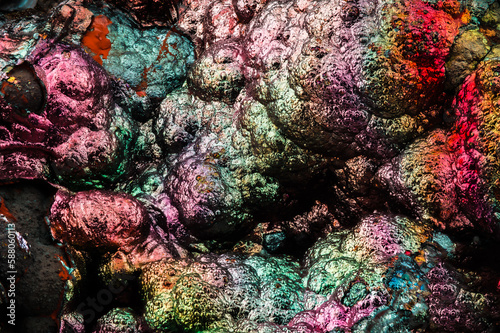 Iridescent goethite from spain. macro detail texture background. close-up raw rough unpolished semi-precious gemstone photo