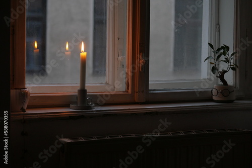 Konstfotografi candle in the window