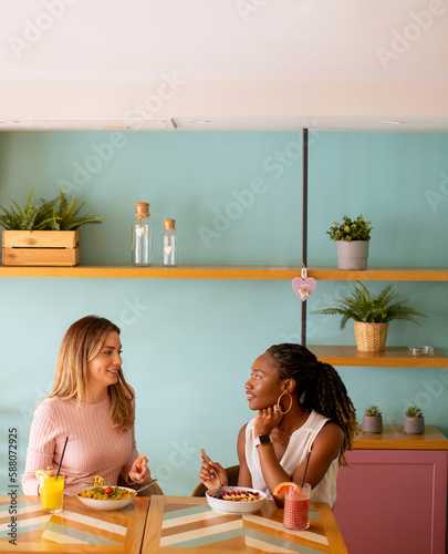 Young black and caucasian w...