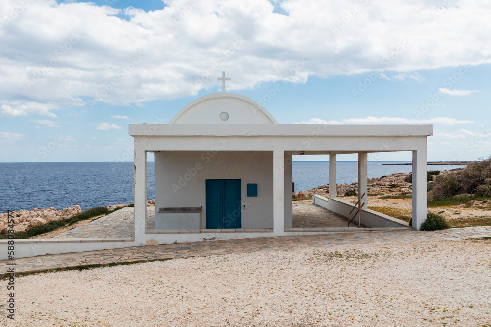 Fototapeta premium Greek Ayioi Anargiroi Church in Cyprus. A small Orthodox church on an island by the sea