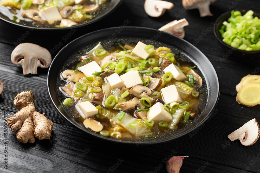 Cabbage Tofu Soup with mushrooms and spring onion. Cabbage Tofu Soup with mushrooms and spring onion.
