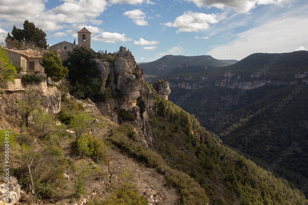 Castle on mountain. Siurana. Landscape with clouds.
