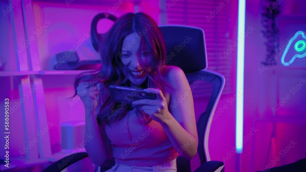 Girl gamer having fun with gaming on smartphones, technology concept, recreation
Girl gamer having fun with gaming on smartphones, technology concept, recreation