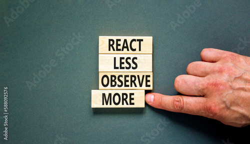 React less observe more symbol. Concept words React less observe more on wooden block. Beautiful grey table grey background. Motivational business react less observe more concept. Copy space.