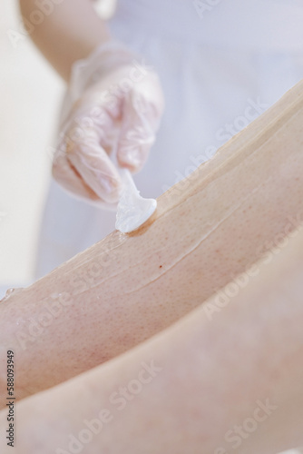 Wallpaper Mural shaving leg with laser. beauty treatment Torontodigital.ca