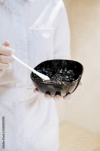 women holding gel for beauty treatment