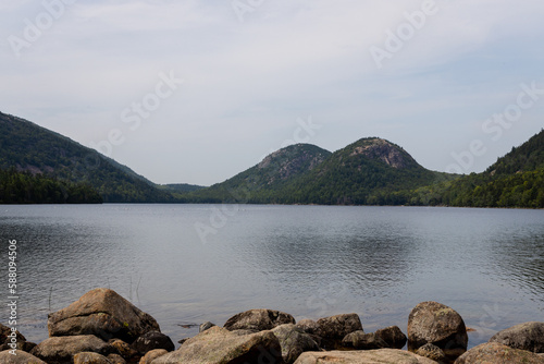 Mountains near a pond and rocky coast