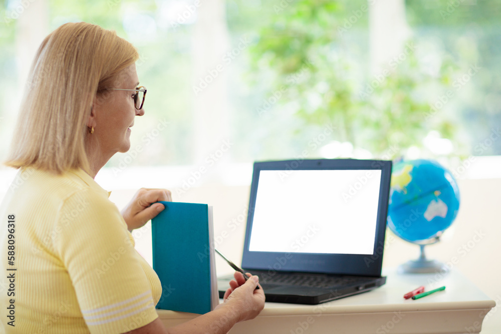 Online remote learning. Teacher with computer. Online remote learning. Teacher with computer.