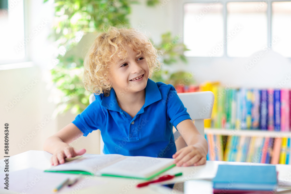 Child doing school homework. Online learning. Child doing school homework. Online learning.
