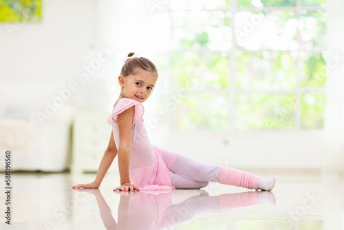 Baby ballet. Little ballerina girl in dance class.