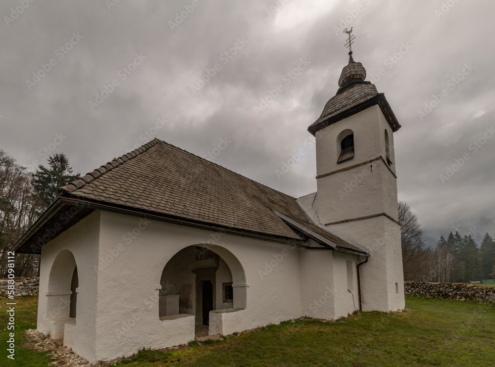 Sveta Katarina church over Zasip village in spring morning in Slovenia Sveta Katarina church over Zasip village in spring morning in Slovenia