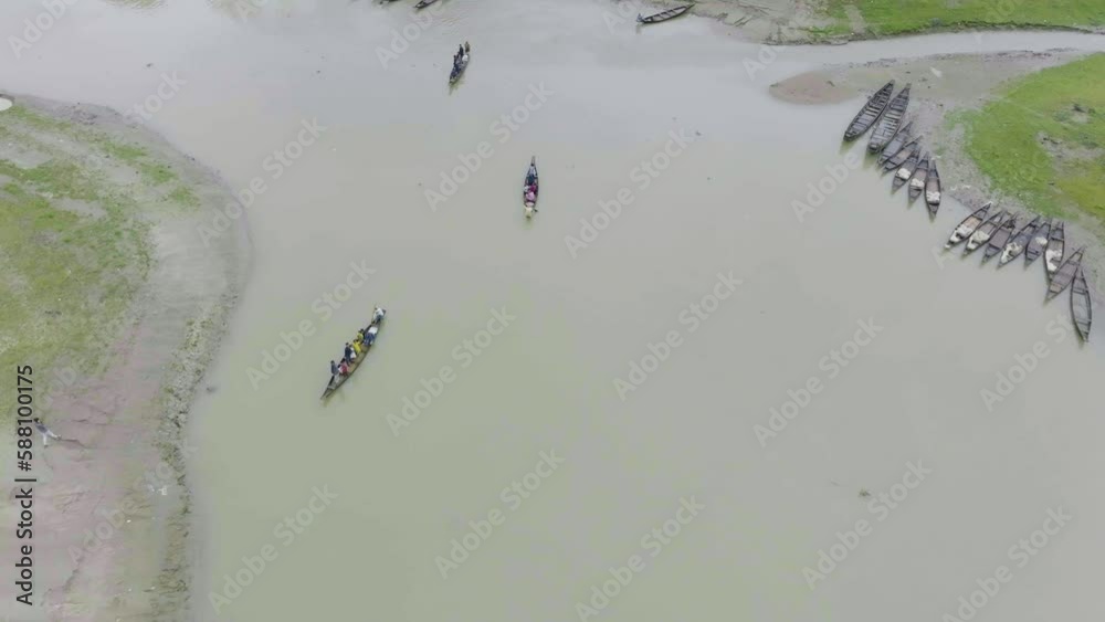 Boat on the river and river in the village, aerial top smooth video footage, Companiganj, sylhet, Bangladesh