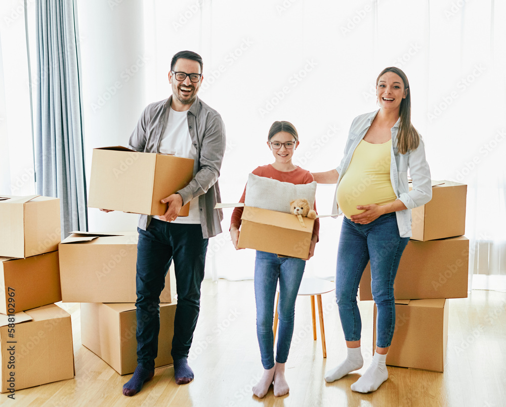 Foto de child family box home house moving happy apartment pregnant mother father daughter