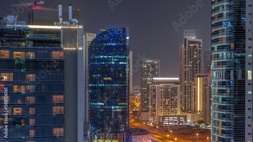 Cityscape of skyscrapers in Dubai Business Bay aerial night timelapse © neiezhmakov