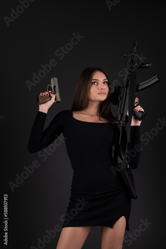 Wallpaper Mural Young Woman With Hand Gun Torontodigital.ca