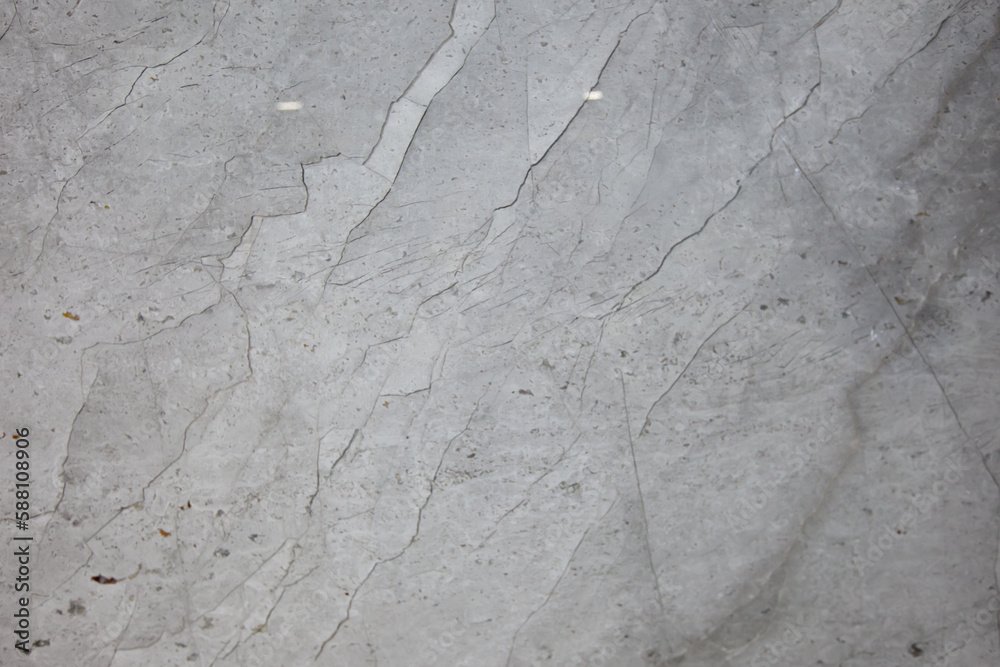Naklejka premium Silver grey marble with dark grey vertical vein natural slab texture close up