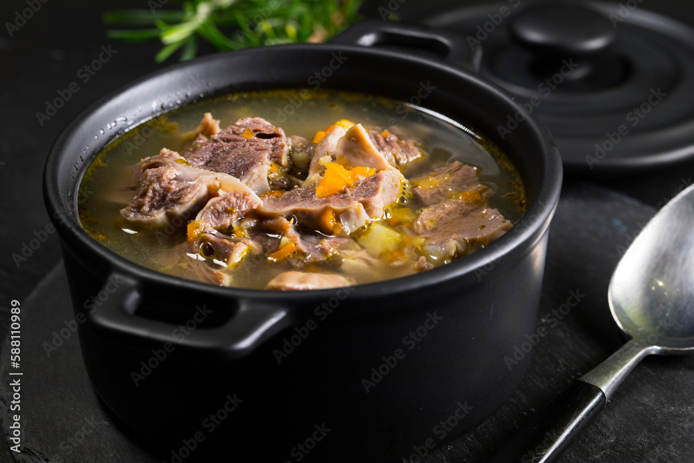 Chicken gizzards stewed with carrot in sauce. Chicken gizzards stewed with carrot in sauce.