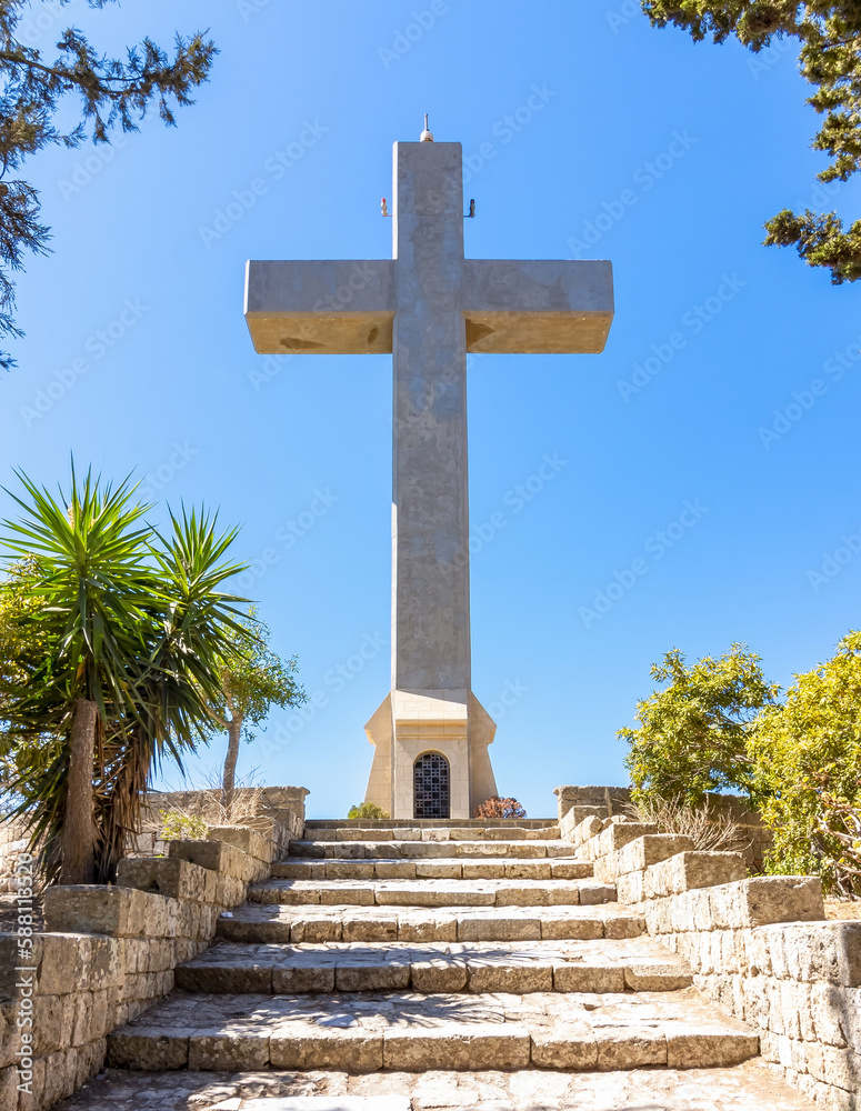 Cross on top of Filerimos mountain, Rhodes island, Greece Cross on top of Filerimos mountain, Rhodes island, Greece