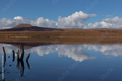Mountains and clouds reflections in the North