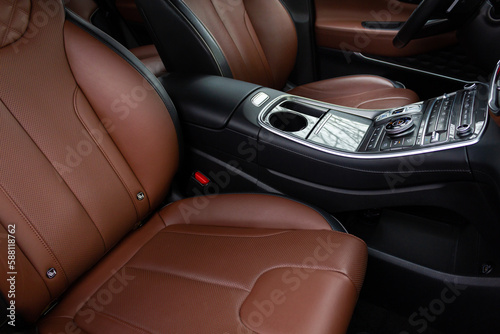 Interior of a modern luxury car. Leather car seat. © Brylynskyi