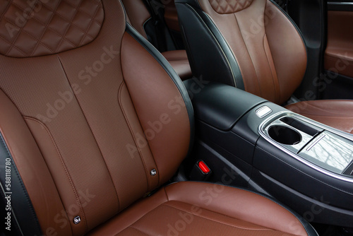 Interior of a modern luxury car. Leather car seat. © Brylynskyi