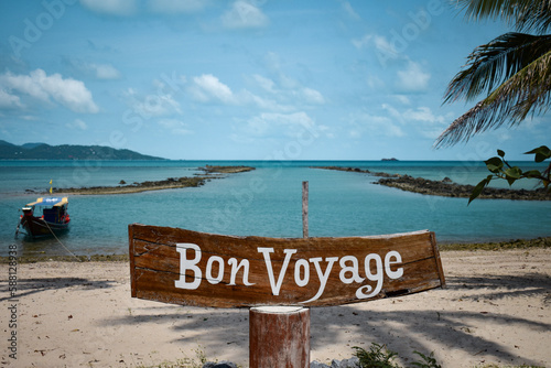 Fototapeta Naklejka Na Ścianę i Meble -  Bon Voyage sign on a paradise island beach in the Gulf of Thailand
