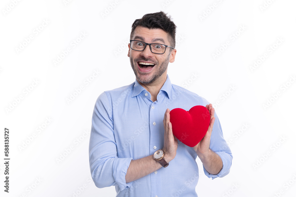 surprised man with love valentine heart isolated on white. man with love valentine heart in studio. surprised man with love valentine heart isolated on white. man with love valentine heart in studio.