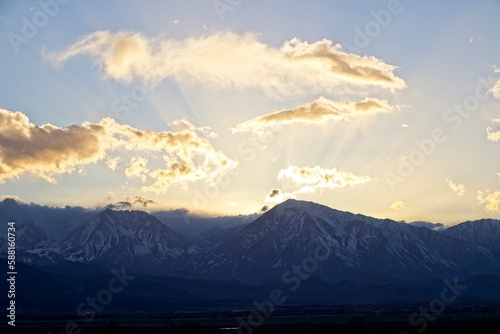 The sun sets over the Sierra Nevada Mountains, as seen from near Bishop, one of the larger cities in the Eastern Sierra region.