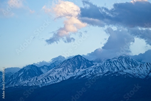 The sun sets over the Sierra Nevada Mountains, as seen from near Bishop, one of the larger cities in the Eastern Sierra region.